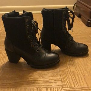 Black heeled combat boots